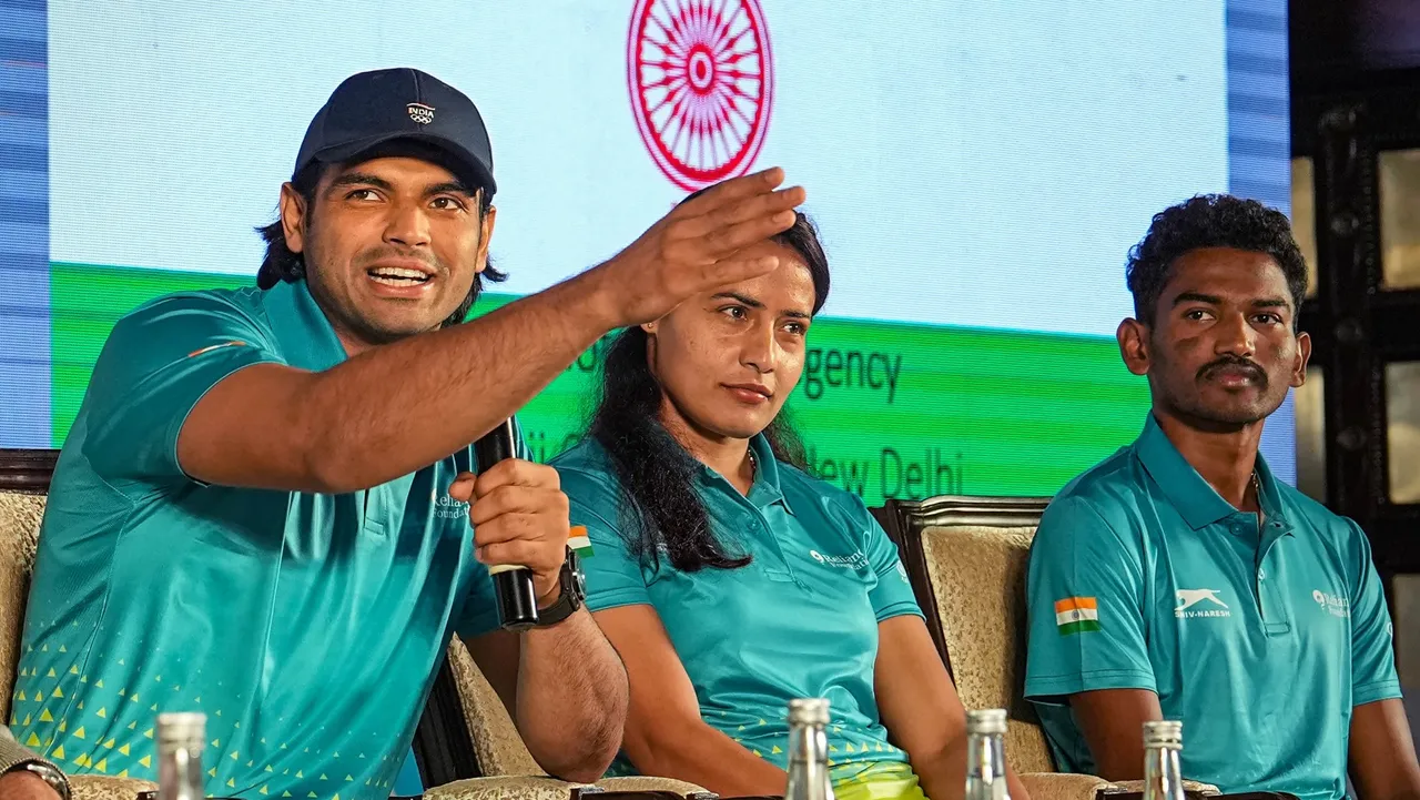 Indian medalists Neeraj Chopra with Annu Rani and Avinash Mukund Sable speaks during the felicitation ceremony of Hangzhou 2022 Asian Games athletes by the Athletics Federation of India, in New Delhi