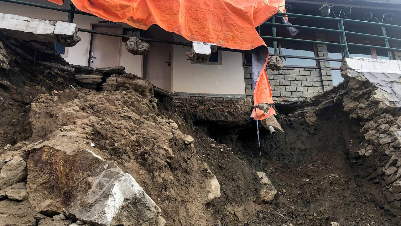 A collapsed part of a house due to landslides at Joshimath in Chamoli district of Uttarakhand on Saturday