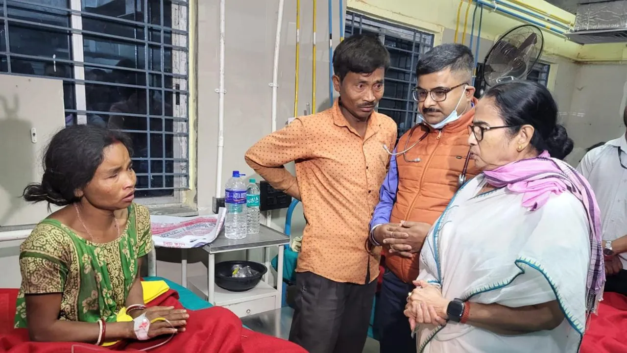 West Bengal Chief Minister and TMC supremo Mamata Banerjee visits people injured in a storm, at a hospital in Jalpaiguri district, Sunday night, March 31, 2024