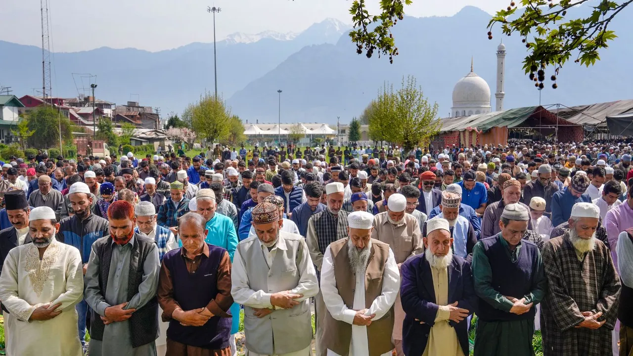 Muslims offer 'namaz' during Eid-al-Fitr celebrations, at Hazratbal Shrine, in Srinagar, Wednesday, 10 April, 2024
