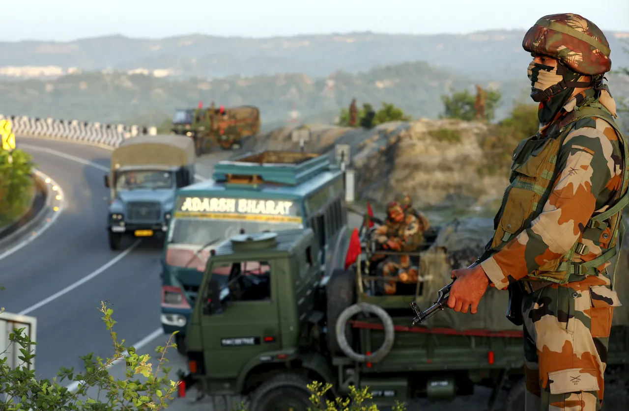 Army personnel keep vigil as a convoy of second batch of Amarnath Yatra 2023 pilgrims leaves for Kashmir, in Jammu