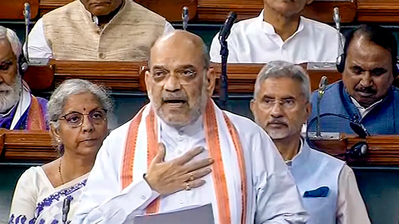 Home Minister Amit Shah speaks in the Lok Sabha during the Monsoon session of Parliament, in New Delhi
