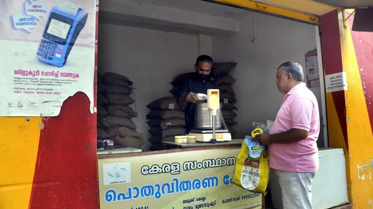 A beneficiary at a ration shop in Kollam district of Kerala