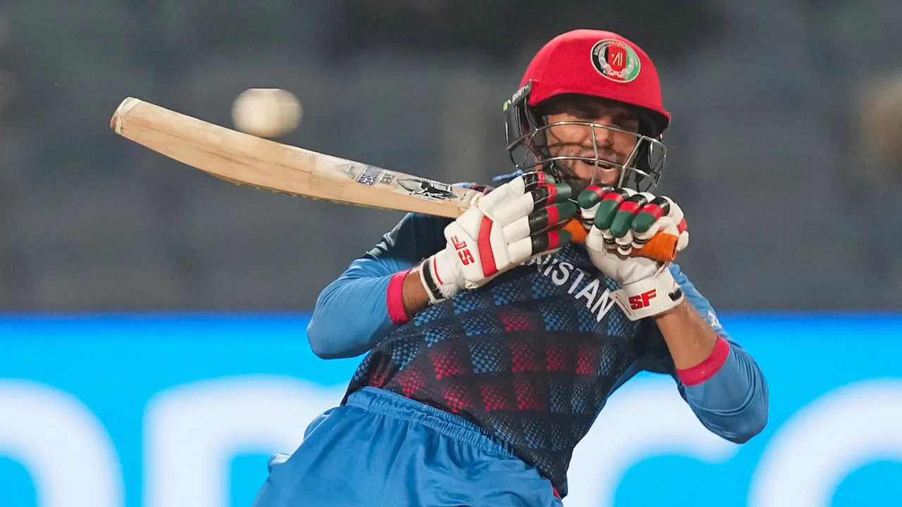 Afghanistan's batter Azmatullah Omarzai plays a shot during the ICC Men's Cricket World Cup 2023 match between Sri Lanka and Afghanistan, at Maharashtra Cricket Association Stadium in Pune, Monday, Oct. 30, 2023.