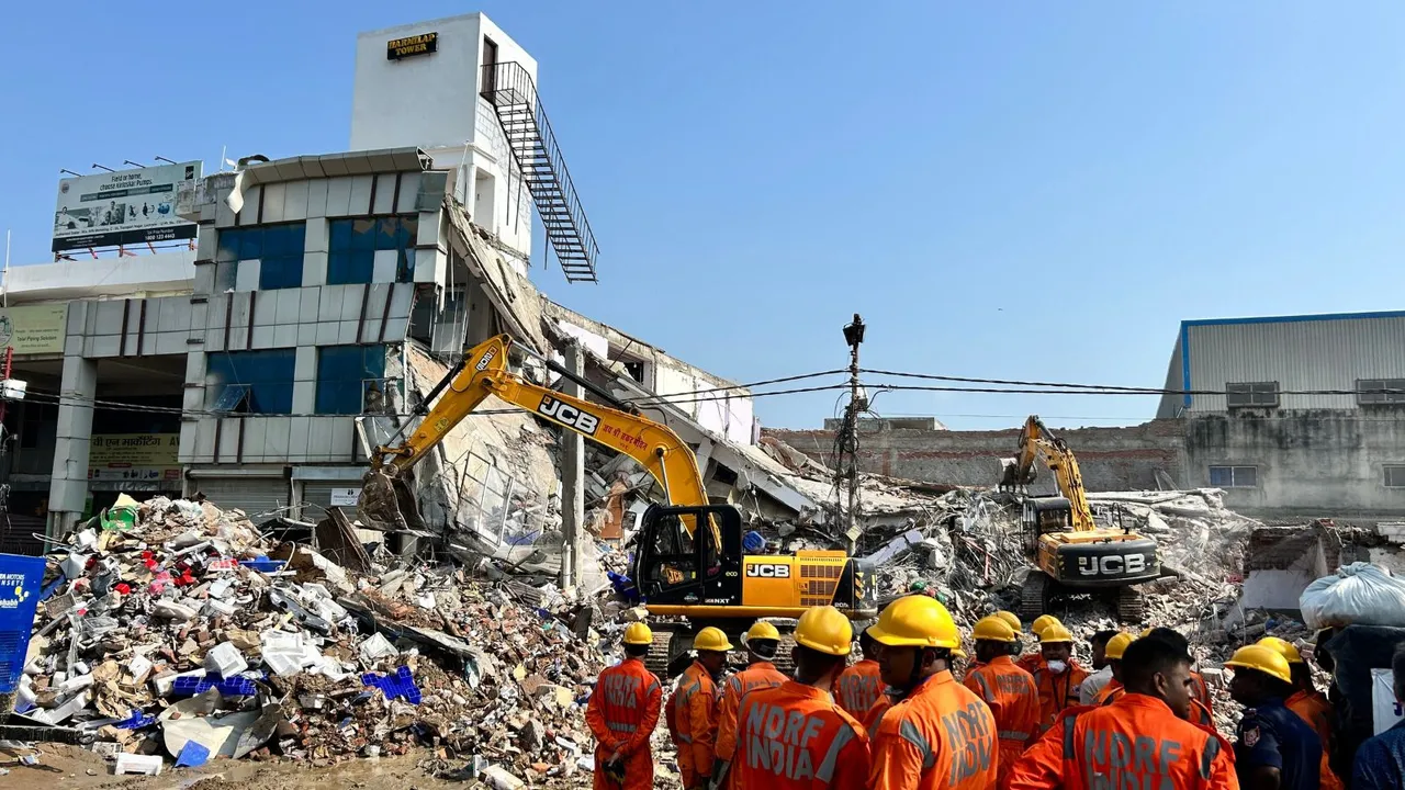 NDRF and SDRF personnel during a relief work underway a day after a building collapsed causing 8 people death, in Lucknow, Sunday, Sept. 8, 2024.