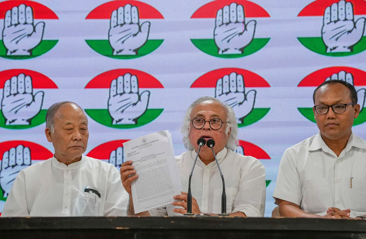 AICC General Secretary Jairam Ramesh with Congress leader from Manipur Okram Ibobi (left) and party MLA Keisham Meghachandra Singh (right) addresses a press conference, at AICC headquarters in New Delhi