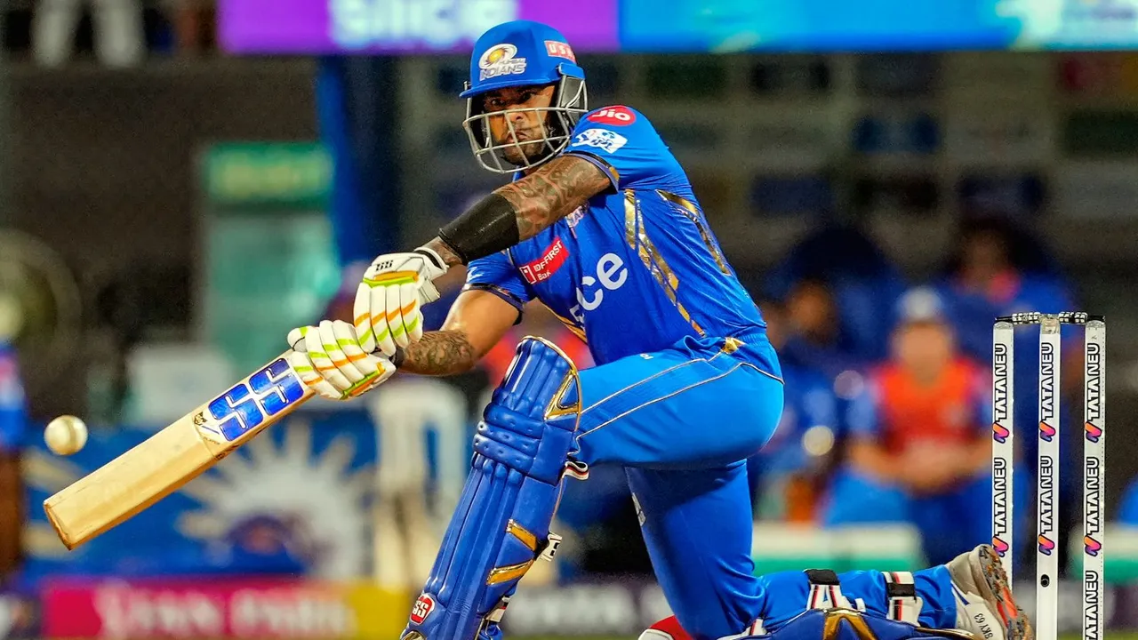 Mumbai Indians player Suryakumar Yadav plays a shot during the IPL 2024 cricket match against Royal Challengers Bengaluru and Mumbai Indians at Wankhede Stadium, in Mumbai, Thursday, April 11, 2024