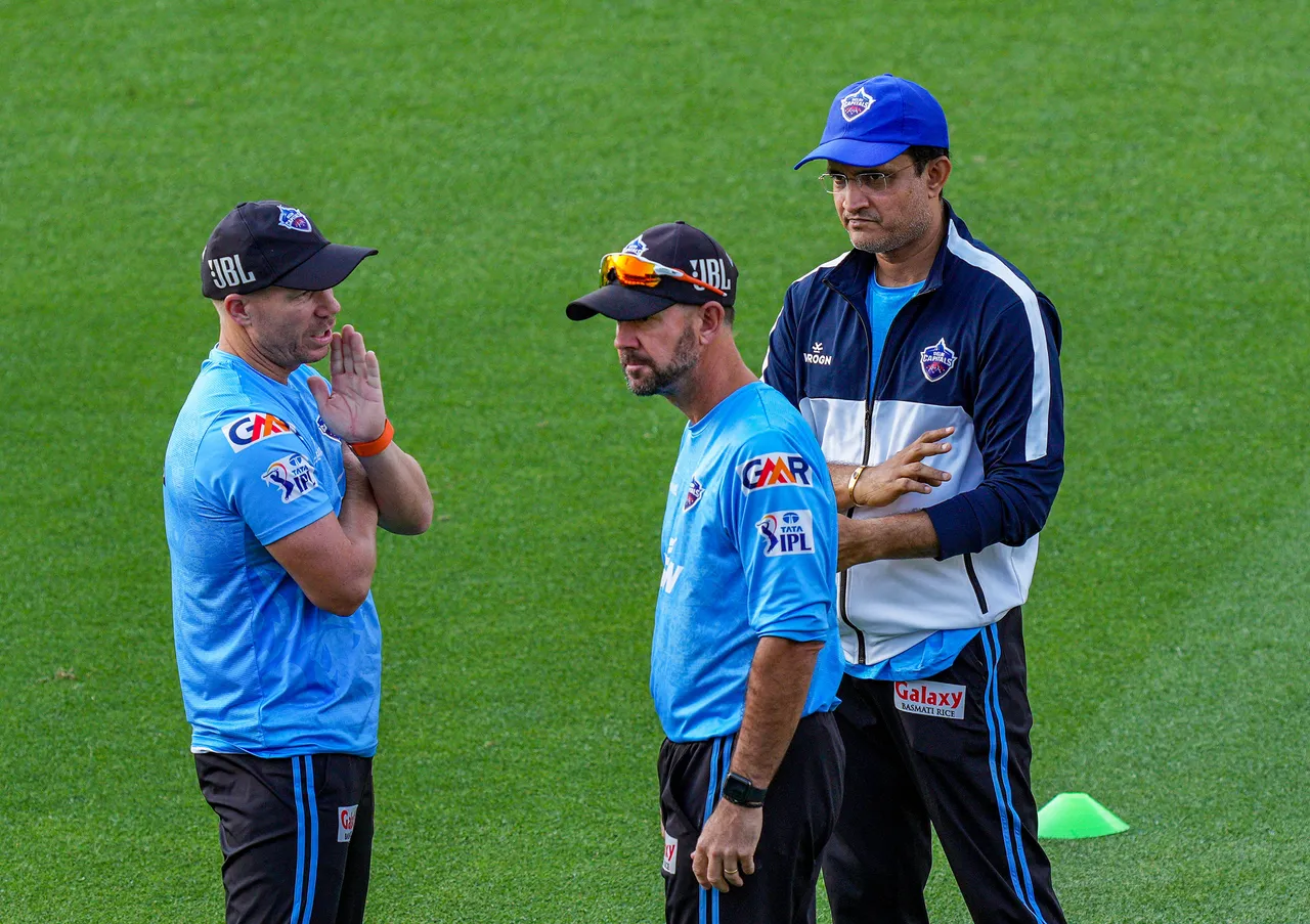 Delhi Capitals captain David Warner with coach Ricky Ponting and Sourav Ganguly during a practice session