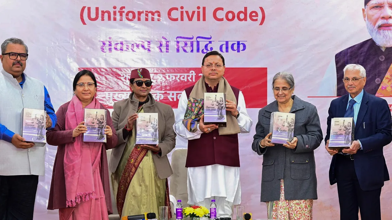 Uttarakhand Chief Minister Pushkar Singh Dhami with retired Supreme Court judge Ranjana Prakash Desai and others at Chief Sevak Sadan, in Dehradun