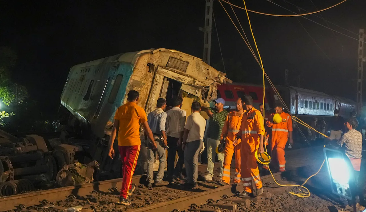  Rescue teams during a rescue and search operation after the accident involving three trains that claimed at least 261 people and left over 900 injured in Balasore 