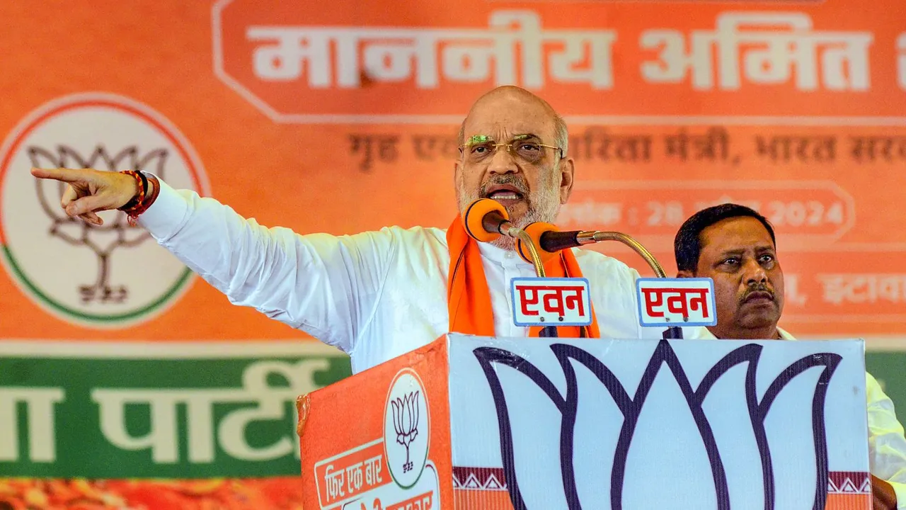 Union Home Minister and BJP leader Amit Shah addresses a public meeting for Lok Sabha elections, in Etawah, Sunday, April 28, 2024