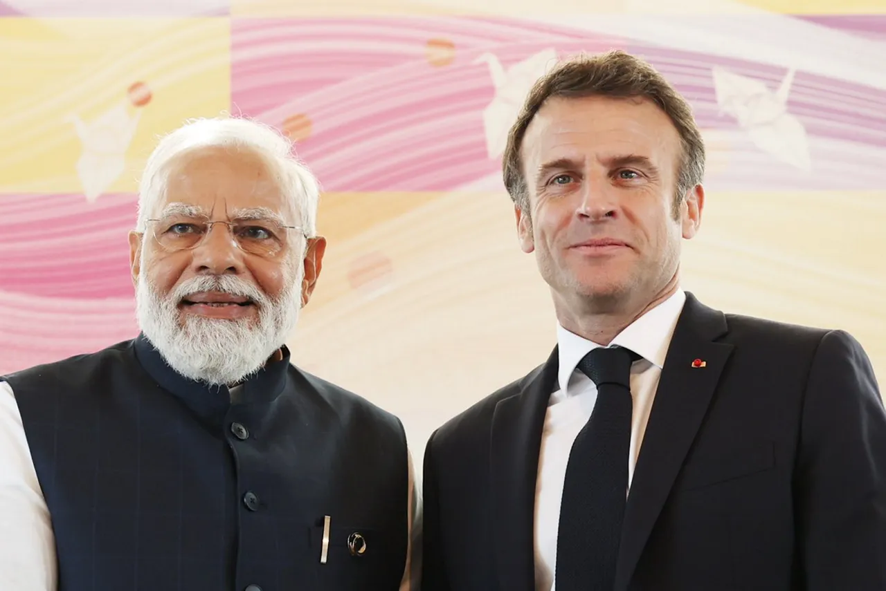 Prime Minister Narendra Modi with French President Emmanuel Macron during a meeting, at the G-7 Summit in Hiroshima, Japan