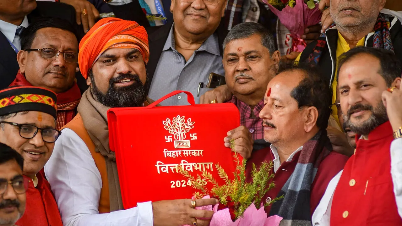 Bihar Deputy CM and Finance Minister Samrat Chaudhary displays a folder-case containing State Budget 2024-25 papers