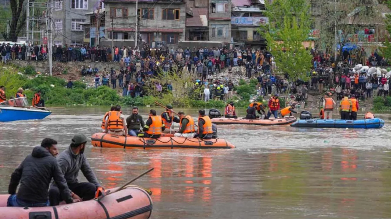Rescue operation underway after a boat capsized in the Jhelum river, on the outskirts of Srinagar, Tuesday, April 16, 2024. Atleast six people have died, according to officials.