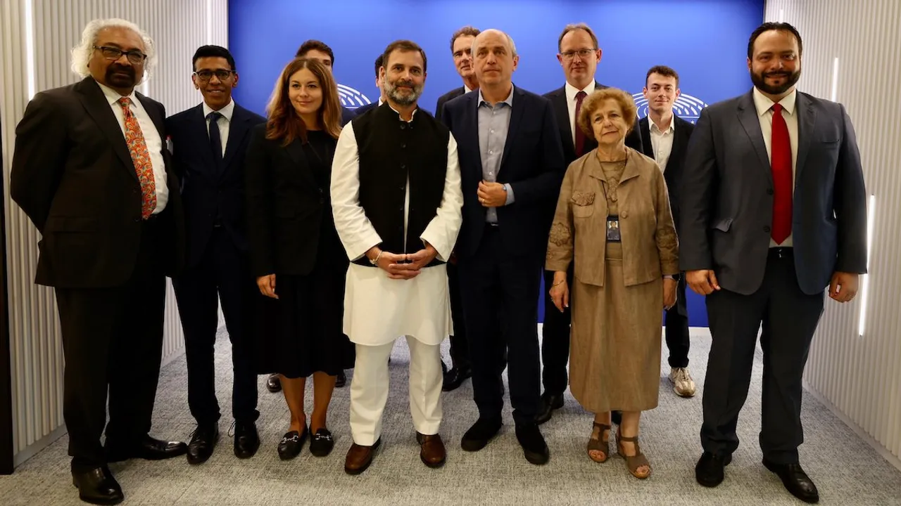 Rahul Gandhi and Sam Pitroda with European Union lawmakers in Brusels