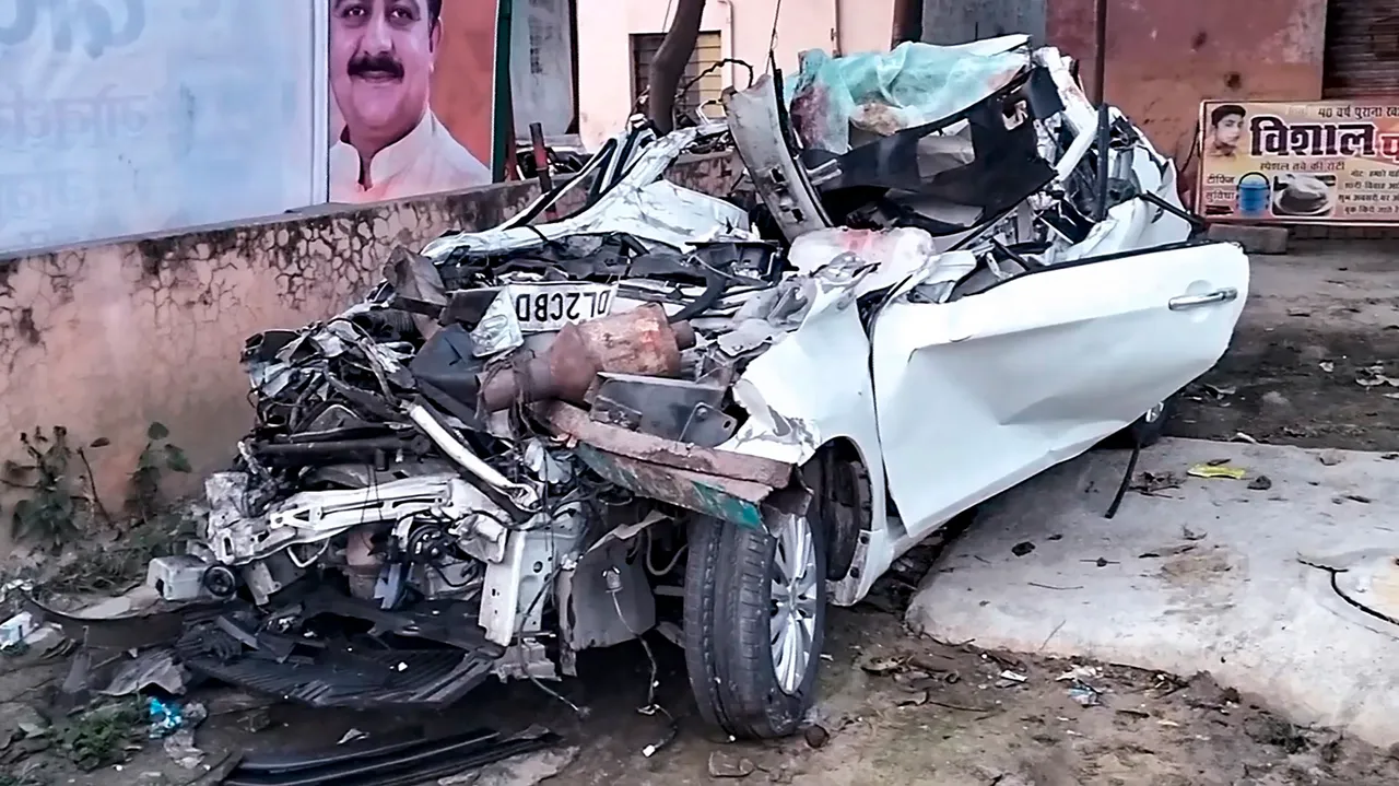 Wreckage of a car after its collision with a truck on the Delhi-Haridwar national highway, in Muzaffarnagar
