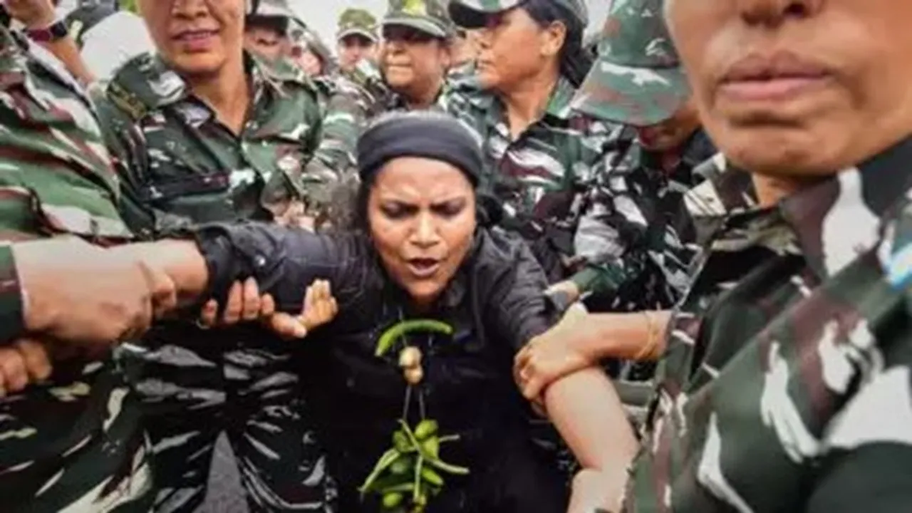 Congress MP Jebi Mather being detained in an earlier protest 