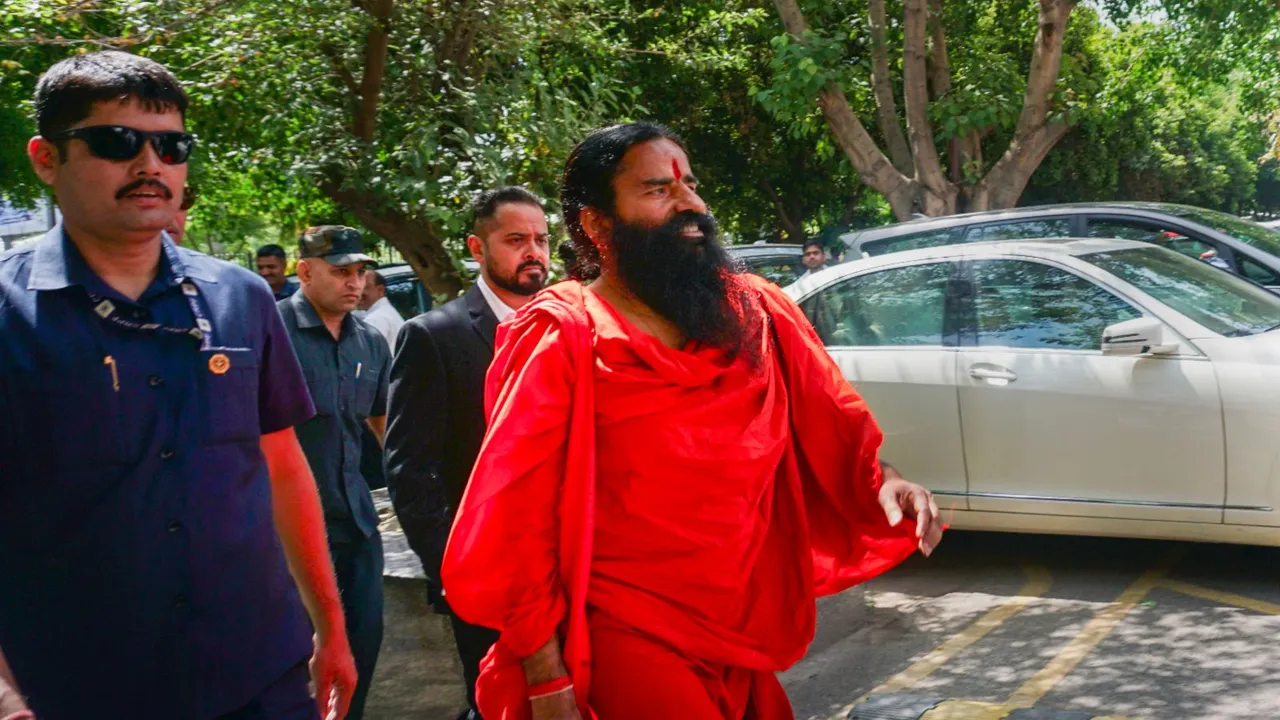 Patanjali Ayurved co-founder Baba Ramdev arrives to appear before the Supreme Court, in New Delhi, Tuesday, April 30, 2024