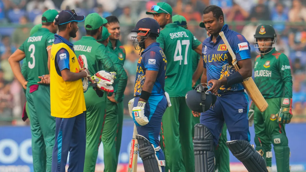 Angelo Mathews leaves the ground after being given 'timed out' by umpire as Bangladeshi players celebrate his wicket during the ICC Cricket World Cup 2023 match at the Arun Jaitley Cricket Stadium in New Delhi on Monday, Nov. 6, 2023.