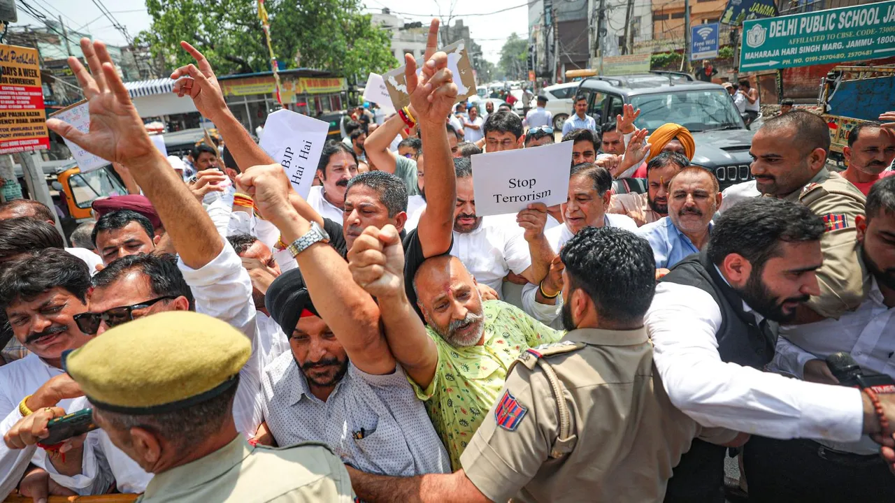 Jammu and Kashmir Pradesh Congress Committee (JKPCC) President Vikar Rasool Wani with party leaders and workers protest against the recent terrorist attacks, in Jammu, Thursday, July 11, 2024.