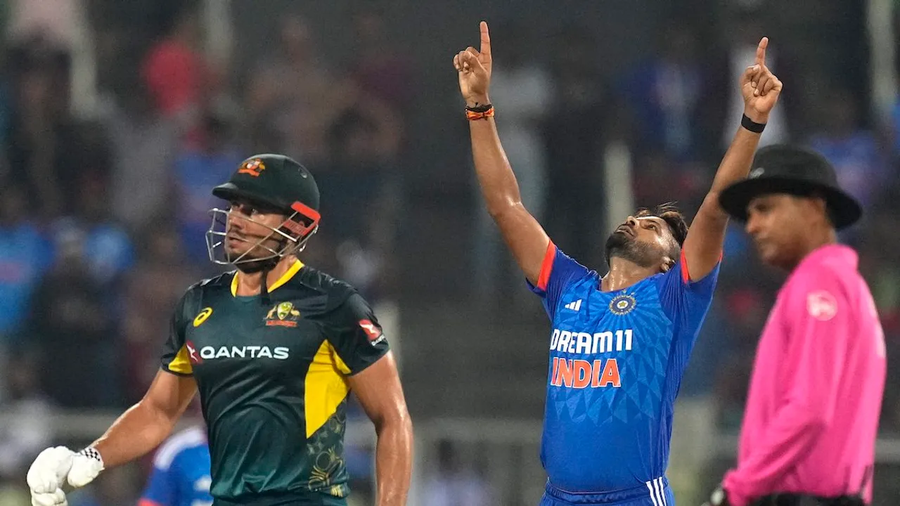 Mukesh Kumar celebrates the wicket of Australia's batter Marcus Stoinis during the second T20 International cricket match of a T20I series between India and Australia, at the Greenfield International Stadium,, in Thiruvananthapuram, Sunday, Nov. 26, 2023.