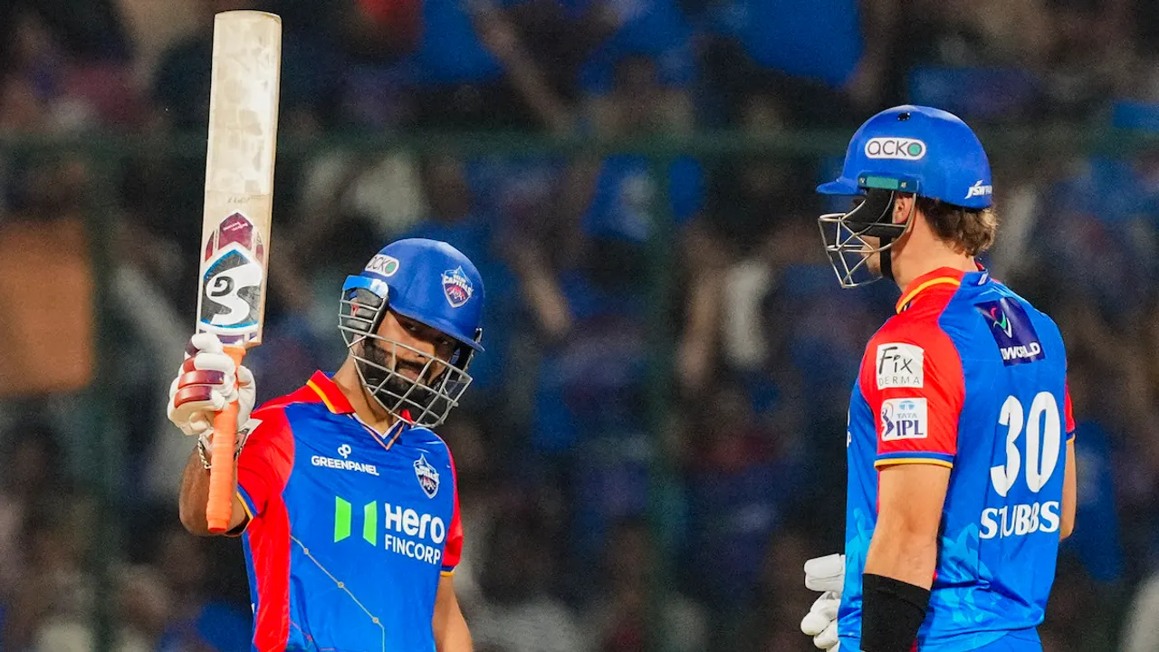 Rishabh Pant celebrates his half century with Tristan Stubbs during an Indian Premier League (IPL) 2024 T20 cricket match between Delhi Capitals and Gujarat Titans, at the Arun Jaitley Stadium, in New Delhi, Wednesday, April 24, 2024