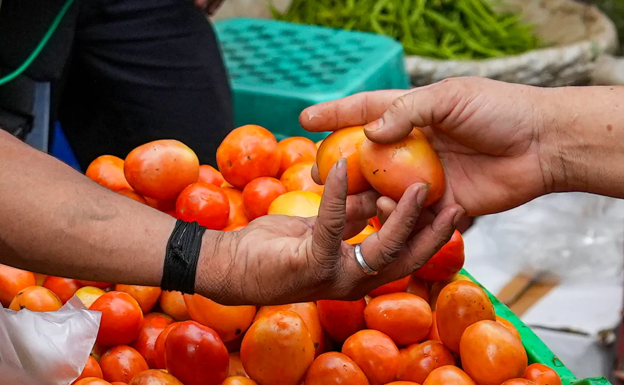 Tomatoes being sold at a market, in New Delhi