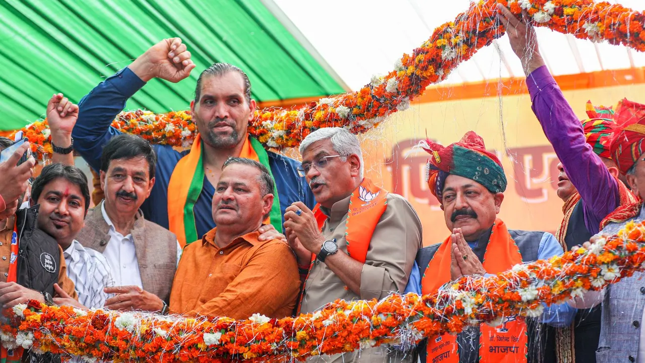 Former WWE wrestler Dalip Singh Rana aka The Great Khali with Union Minister and BJP candidate Jitendra Singh during an election campaign rally ahead of upcoming Lok Sabha elections,