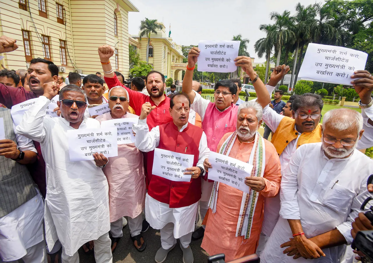 Leader of Opposition in Bihar Assembly Vijay Kumar Sinha with party legislators stages a protest demanding the dismissal of Bihar Deputy CM Tejashwi Yadav