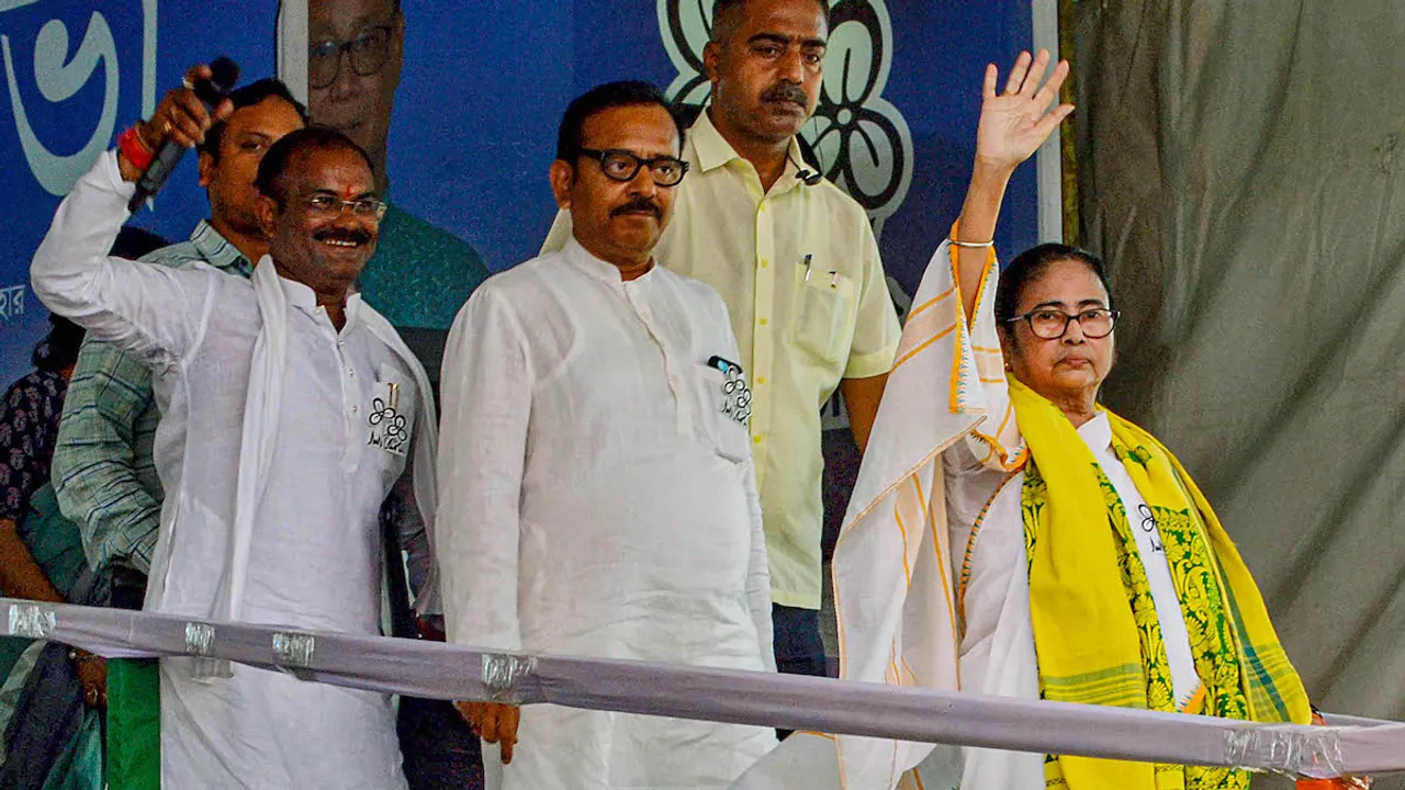 Mamata Banerjee waves at supporters, during a public meeting in support of party candidate Jagadish Chandra Barma ahead of Lok Sabha elections, in Cooch Behar district, Monday, April 15, 2024.