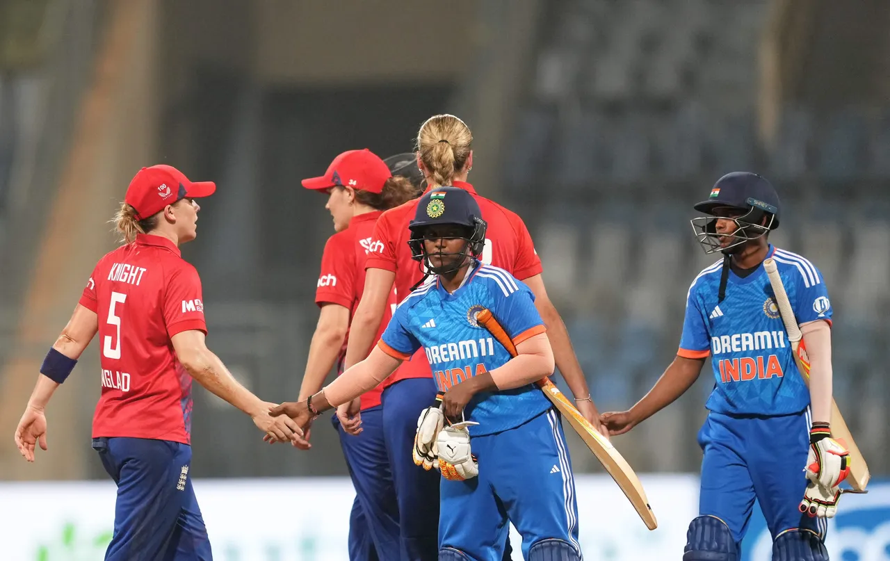 Players of India and England greet each other at the end of the 1st T20I cricket match between India and England
