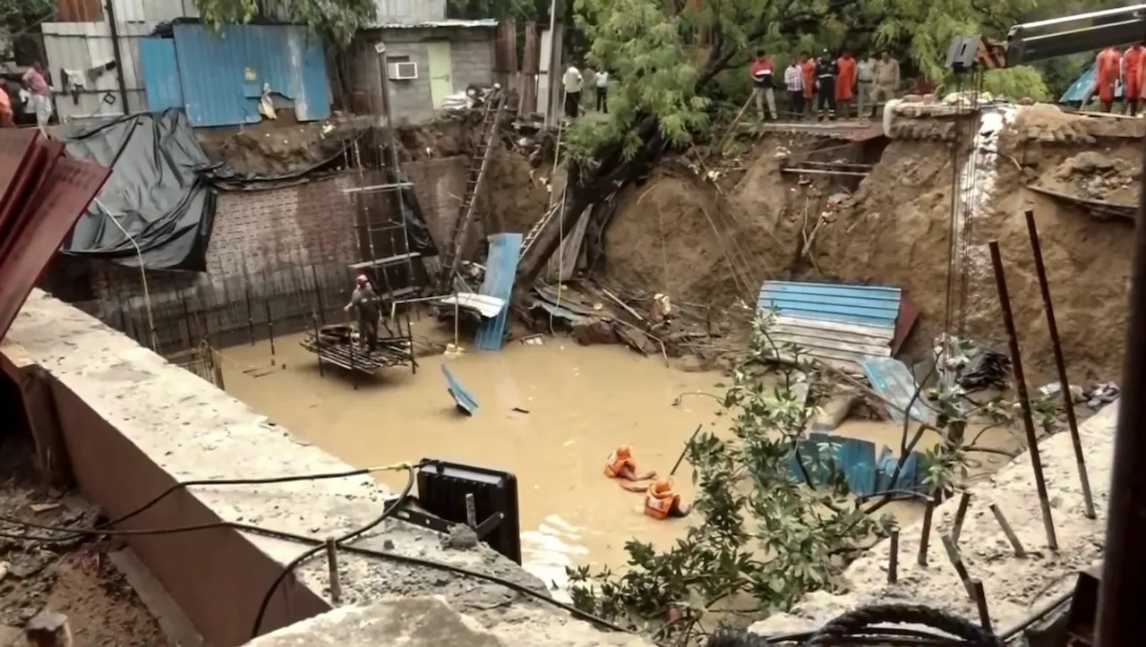 Rescue work underway after an under-construction wall collapsed during rain, at Vasant Vihar area in New Delhi, Friday, June 28, 2024.