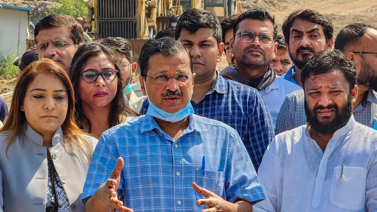 Delhi Chief Minister Arvind Kejriwal with Delhi Mayor Shelly Oberoi and others speaks to the media during his visit to the Ghazipur landfill site