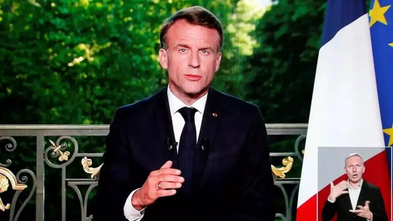 French President Emmanuel Macron addressing the nation from the Elysee presidential palace