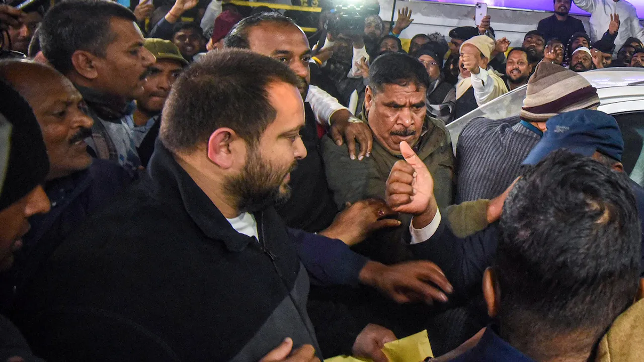 ejashwi Yadav leaves from the Enforcement Directorate (ED) office after being questioned in the alleged land-for-jobs scam case, in Patna, Tuesday, Jan. 30, 2024.