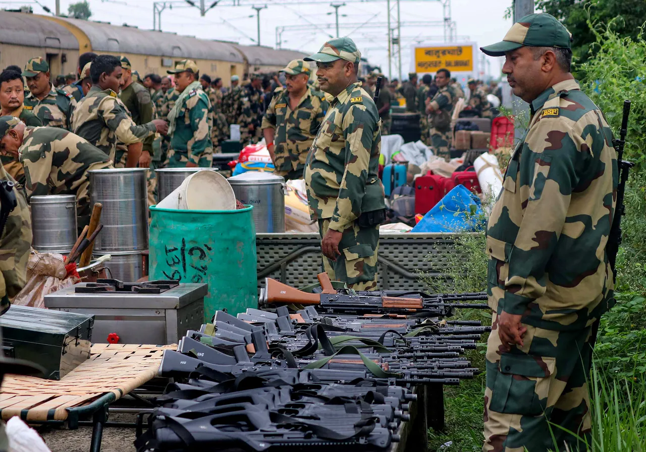 Security forces personnel at Balurghat railway station after their arrival for the upcoming West Bengal panchayat polls, in Balurghat