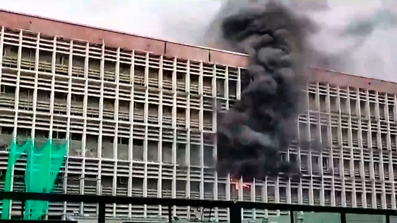 Smoke billows out after a fire broke out in the endoscopy room of AIIMS, in New Delhi