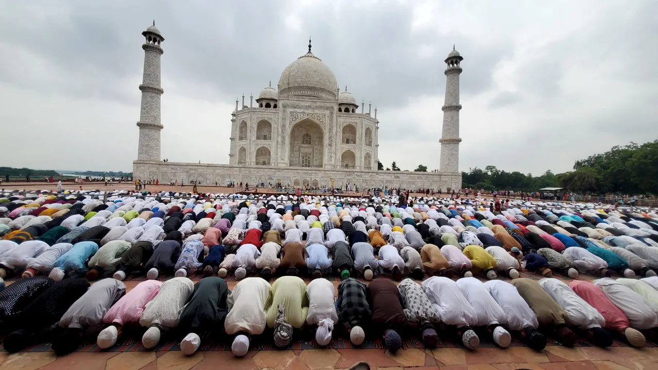 Muslims offer 'namaz' on the occasion of the 'Eid al-Adha' festival, at the Taj Mahal in Agra