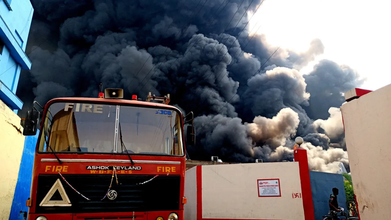 Smoke billows after a fire broke out at a godown in Howrah district