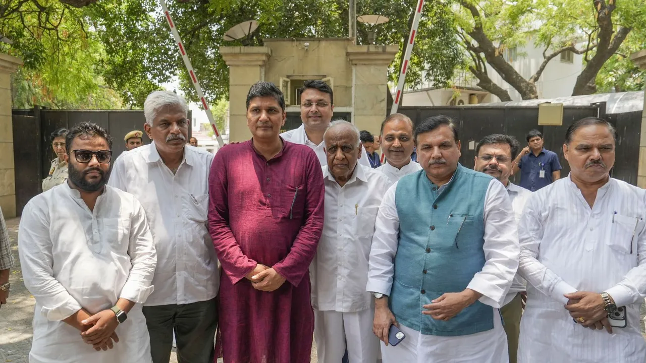 AAP leaders Sanjay Singh and Saurabh Bhardwaj with other party leaders outside Delhi Lieutenant Governor VK Saxena's residence after a meeting regarding the ongoing water crisis in the national capital, in New Delhi, Sunday, June 23, 2024.