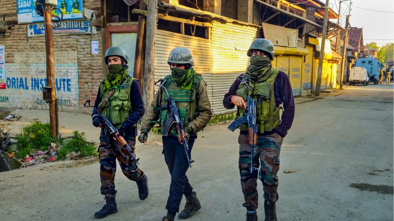 Security personnel cordon off an area after an encounter in Jammu and Kashmir