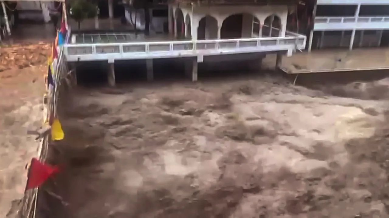 Flash floods in Manikaran as Parvati river water rises due to heavy monsoon rainfall, in Kullu