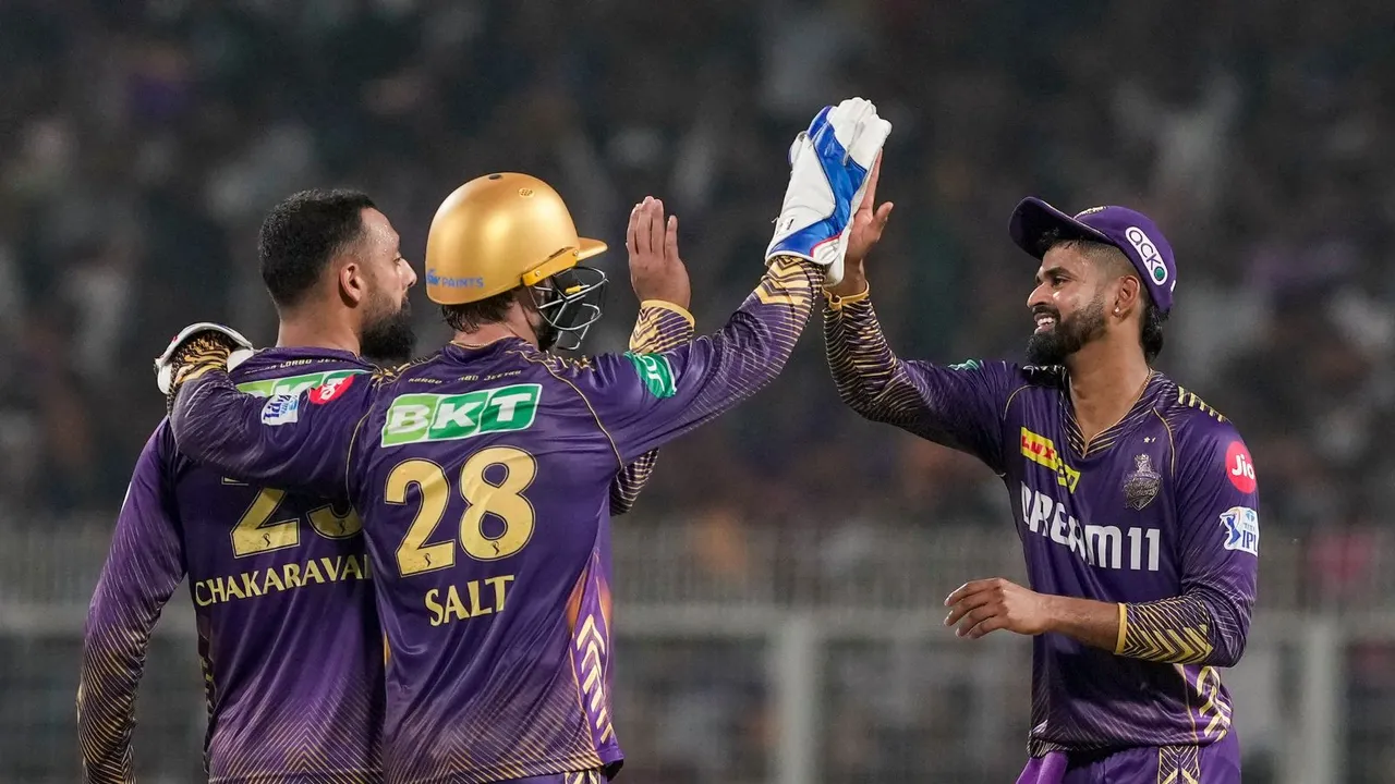 Kolkata Knight Riders bowler Varun Chakravarthy with captain Shreyas Iyer celebrates the wicket of Rajasthan Royals batter Shimron Hetmyer