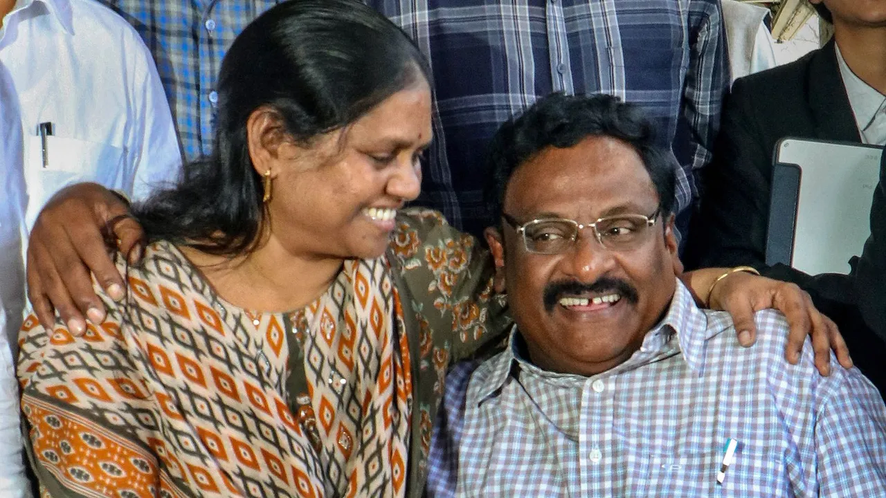 Former Delhi University professor G.N. Saibaba with his wife Vasantha Kumar during a press conference