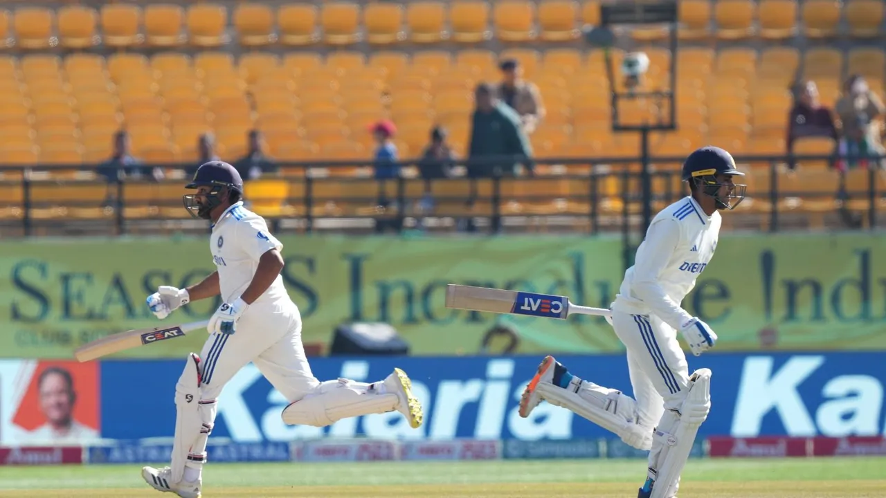 India's batters Rohit Sharma and Shubman Gill run between the wickets during the second day of the fifth Test cricket match between India and England, in Dharamsala