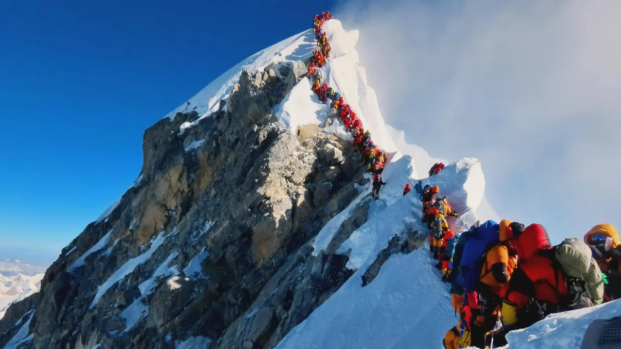 Ten Nepali mountain guides scale Mt. Everest as it opens to climbers for spring season