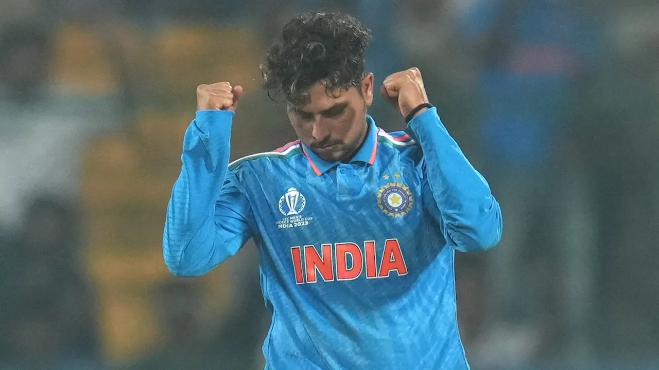  Kuldeep Yadav celebrates the wicket of Netherlands' Logan van Beek during the ICC Men's Cricket World Cup match between India and Netherlands at M Chinnaswamy Stadium, in Bengaluru, Sunday, Nov. 12, 2023.