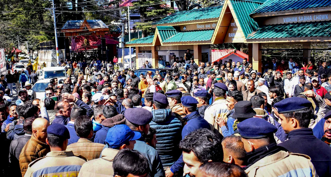 Security personnel deployed to maintain law & order after Congress and BJP workers gathered outside the Himachal Pradesh Legislative Assembly, in Shimla