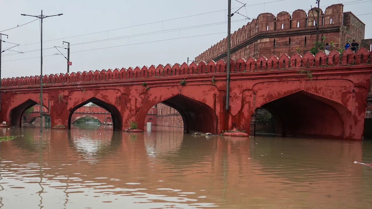 A flooded road behind the Red Fort as the swollen Yamuna river inundates nearby areas, in New Delhi, Friday, July 14