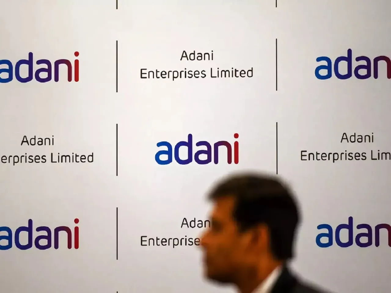 Adani group shares settle on mixed note; Adani Enterprises jumps 15%